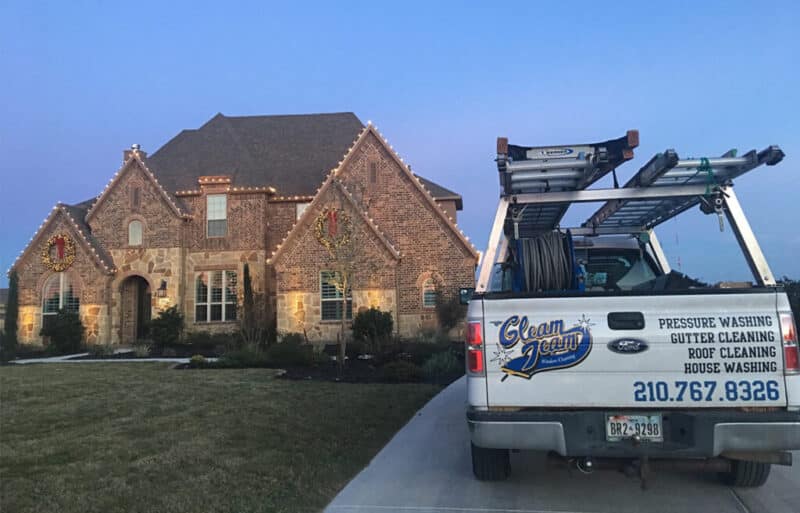 gleam team truck parked outside of san antonio home