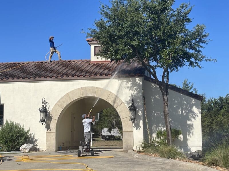 gleam team professional pressure washing a home